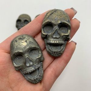 (1) Statement pyrite skull piece